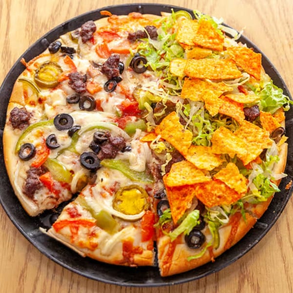 Antigoni’s Pizza with half traditional toppings and half taco-style with Doritos and lettuce.